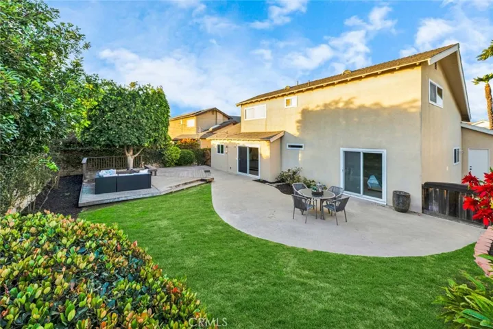 Lush Manicured Backyard Perfect For Entertaining