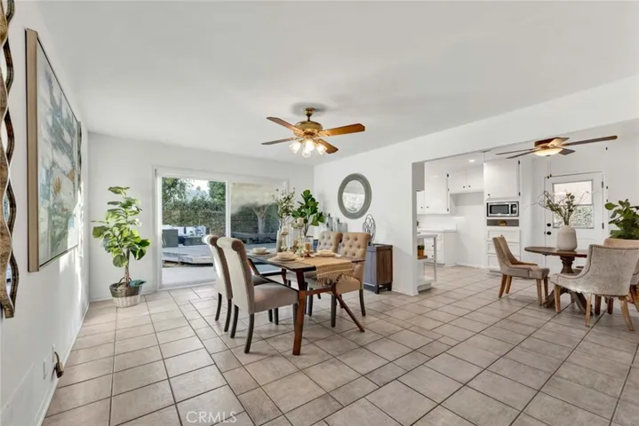 . The Warm and Welcoming Family
Room with Tile Flooring Includes Plenty of Room for Formal Dining