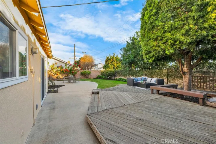 Large Backyard With Wood Deck