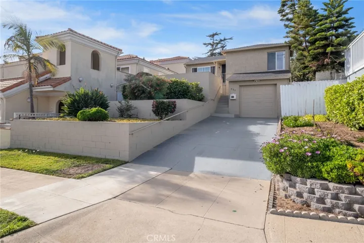 Terraced Front Yard with upper platform for patio.
