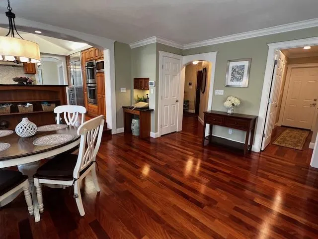 Family Room - access to kitchen, to entryway, to downstairs hallway, to garage
