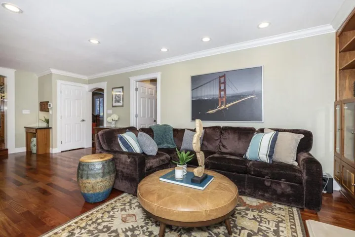 Family Room w/access to entryway and downstairs hallway.