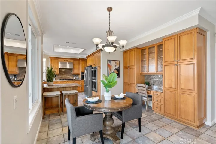 Breakfast Nook and desk area with Maple cabinetry