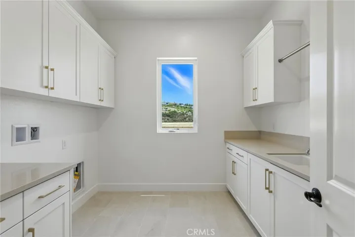 Laundry Room: Silverado Modern Farmhouse - Ridge Collection at Bella Vista - Photo of Homesite 66.