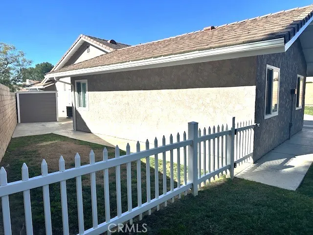 sideyard with storage shed