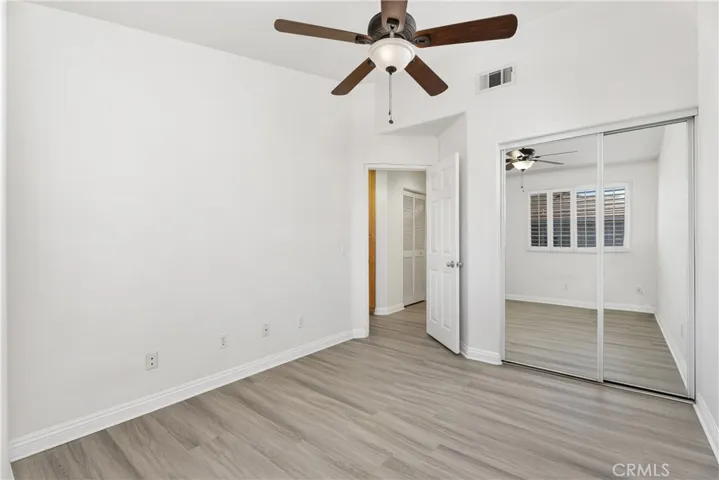 Bedroom #2 with Ceiling Fan and Wardrobe Mirrors