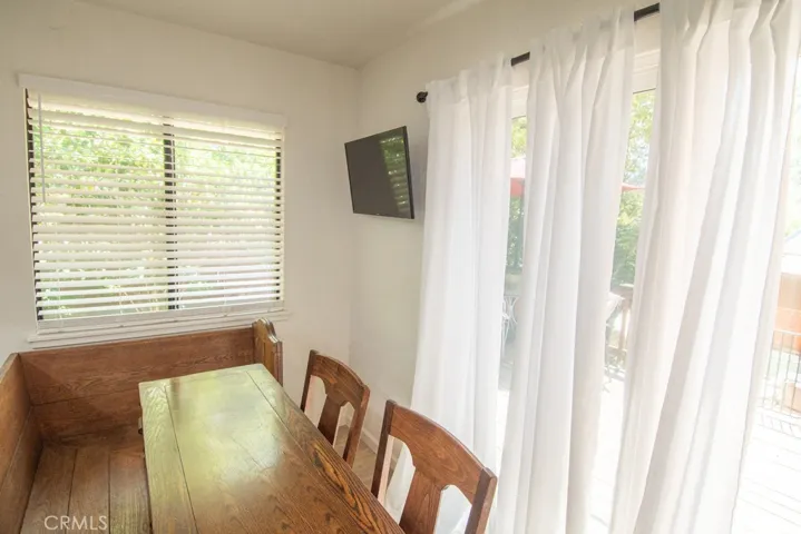 dining area with slider to the back patio