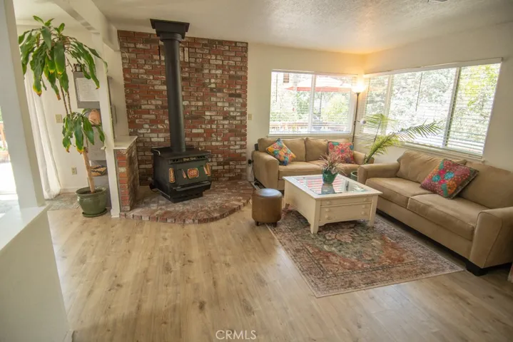 living area beautiful windows and  new floors