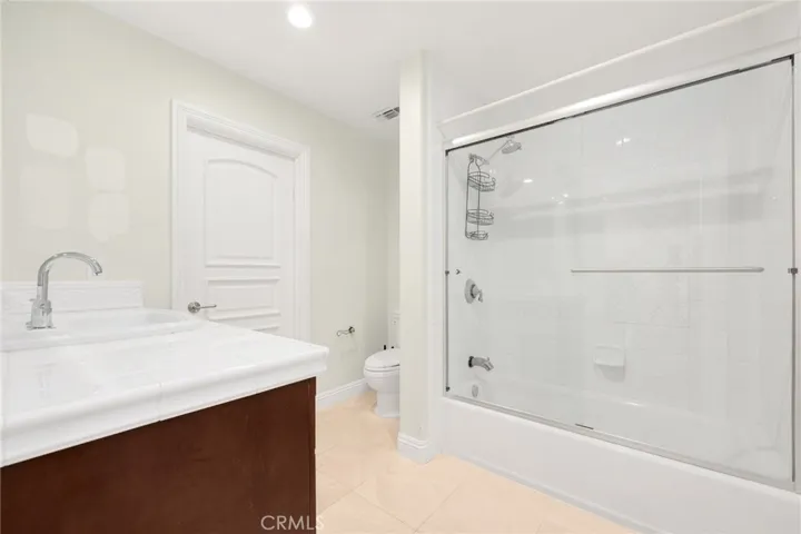 Second En Suite Bedroom's Bath, door to walk-in closet.