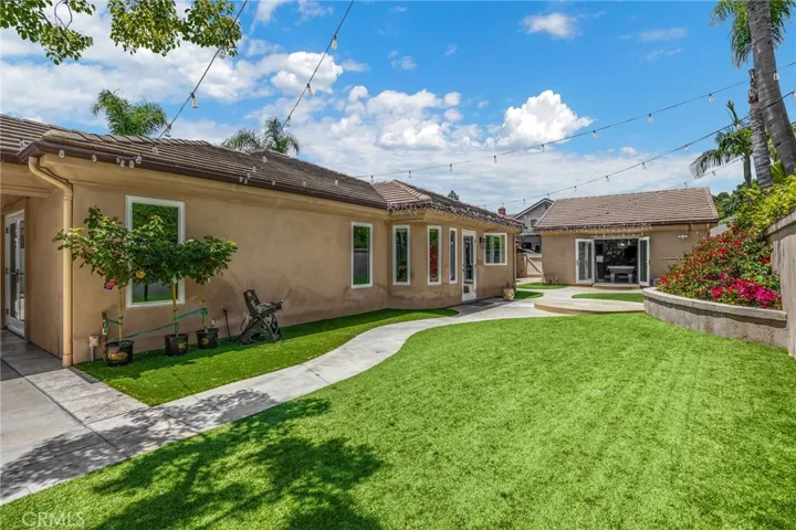 L to R: French Doors off Family Room, Door off Kitchen, Separate-unattached Game Room.