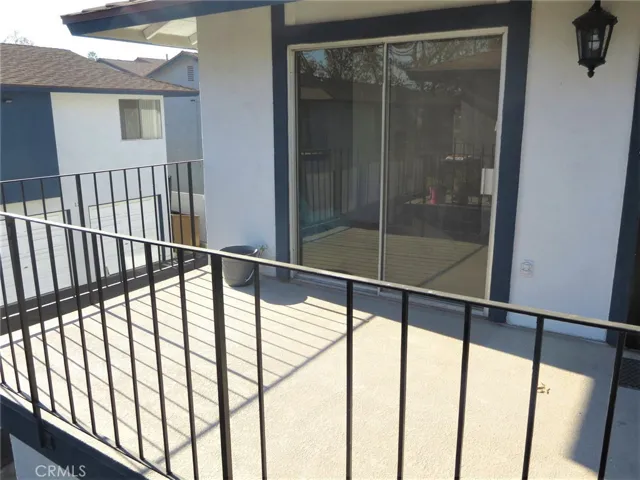 Balcony and sliding glass door off kitchen.