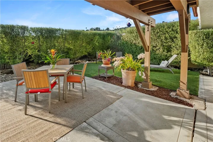 Another view of the fenced private backyard.