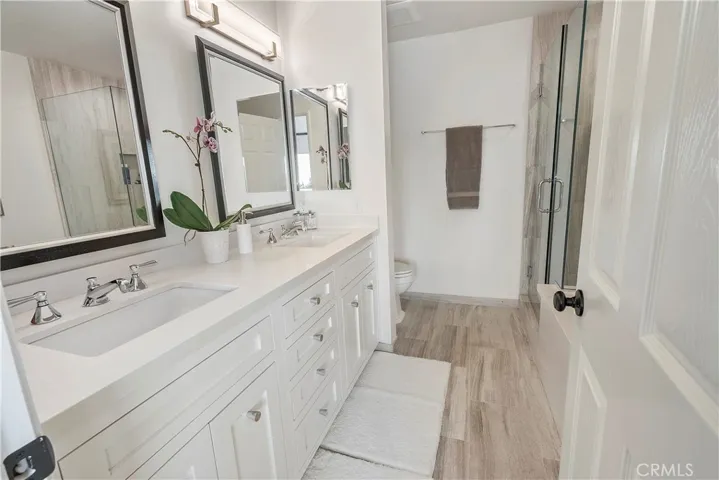 Main Floor Primary Bedroom Soaking Tub and separate shower