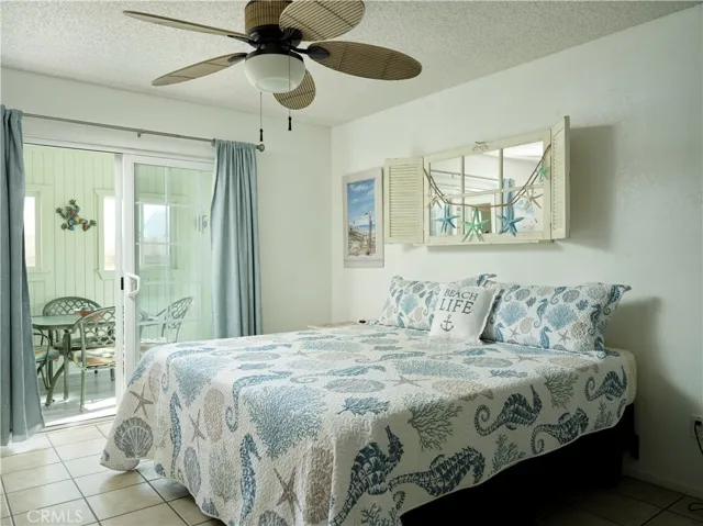 Primary bedroom with access to sunroom