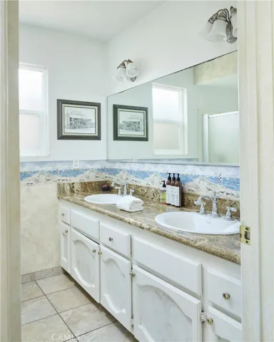 One of two upstairs bathrooms