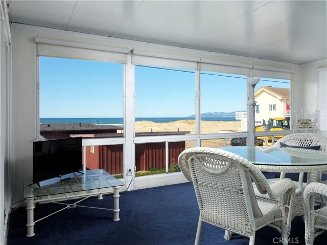 Upstairs sunroom with beautiful views of the ocean