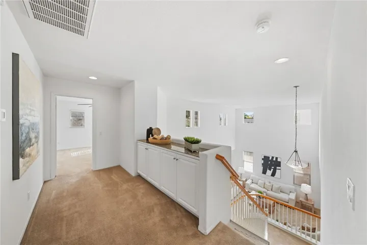 Linen cabinet at top of stairs for extra storage