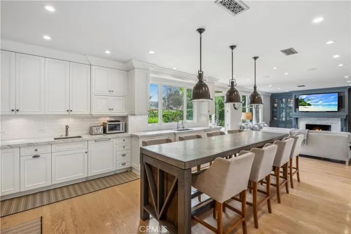 Kitchen with dual ovens & dishwashers, and island
