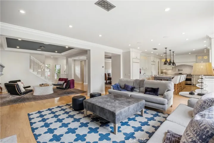 Living room opens to family room and kitchen