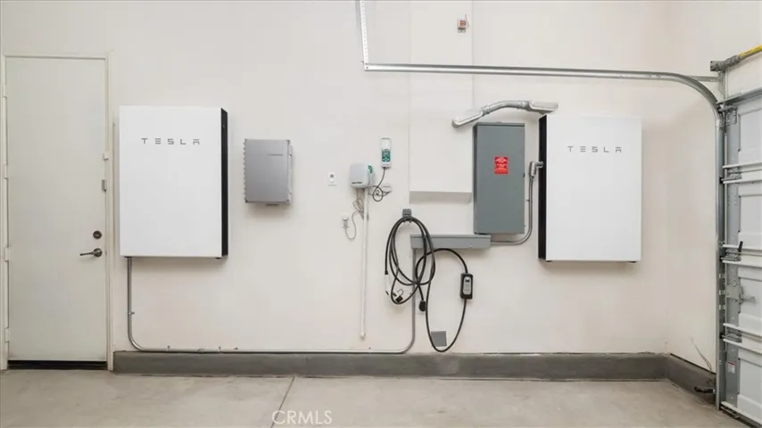 Garage-two tesla backup batteries (optional)
