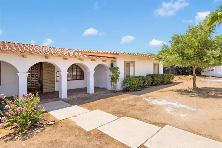 Beautiful gated front court yard with fresh paint!