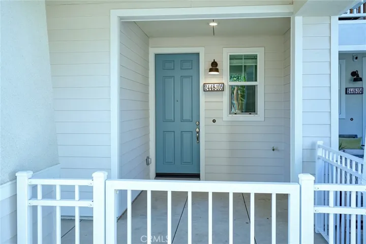 Huge private front porch extends the full length of the Townhome