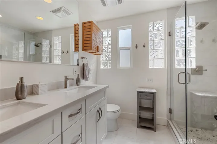 Upper level bathroom with walk in shower