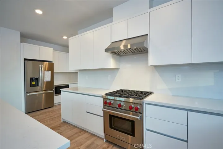Gourmet kitchen w/Wolfe Gas Range and top of the line appliances throughout.