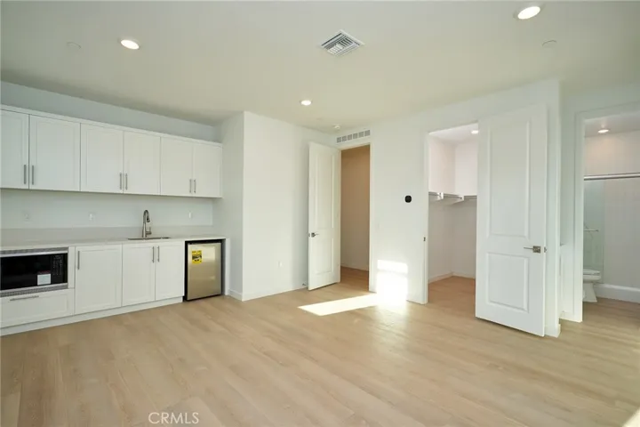 Studio unit on 1st floor can be a traditional bedroom, guest space, in law suite, or work from home!