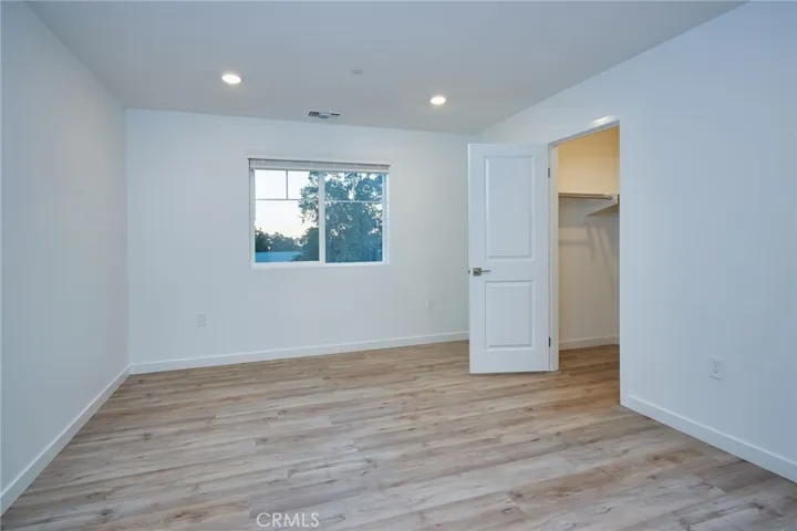 Secondary bedroom suite with walk in closet and en suite bathroom