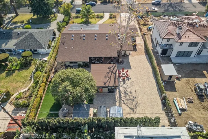 Birds Eye View of Property with Solar