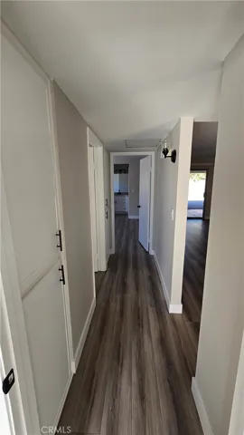 Hallway with Linen cabinets.