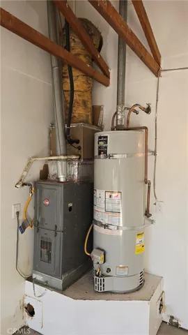 Furnace and strapped water heater.