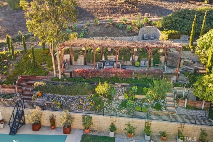Terraced garden with sitting areas.