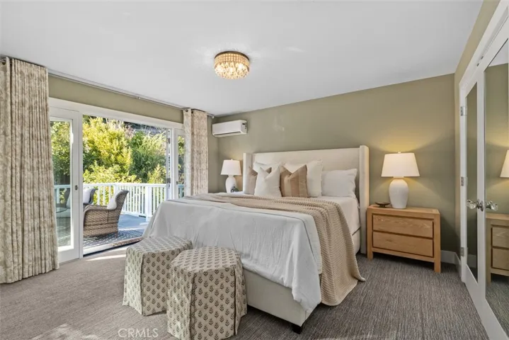 Primary Suite with Double french doors to deck.