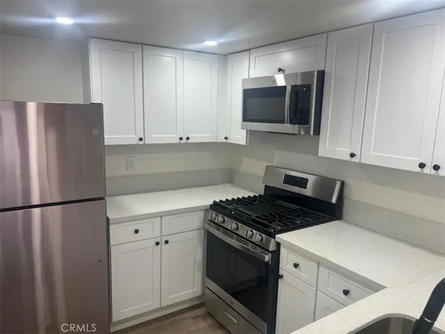 NEW STAINLESS STEEL APPLIANCES