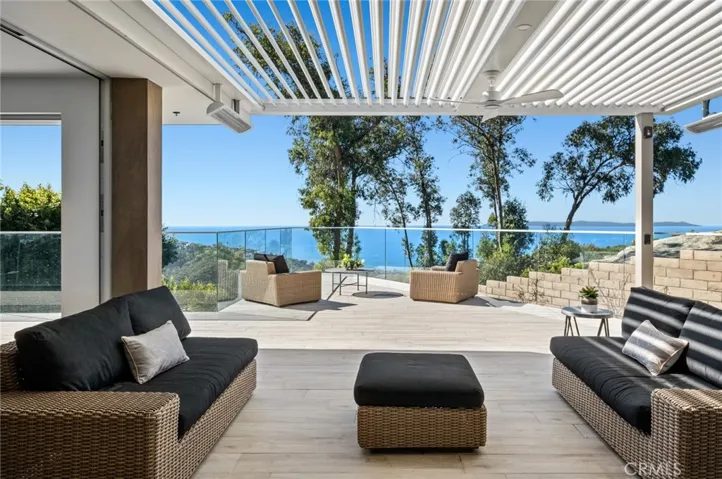 Panoramic views are enjoyed from both levels of the estate, with large decks and a fabulous backyard extending living areas into the outdoors