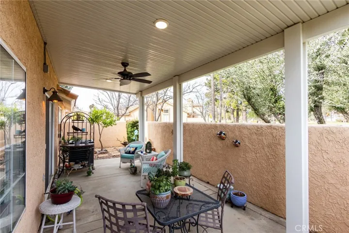 Alumawood patio cover with lighting and fan.