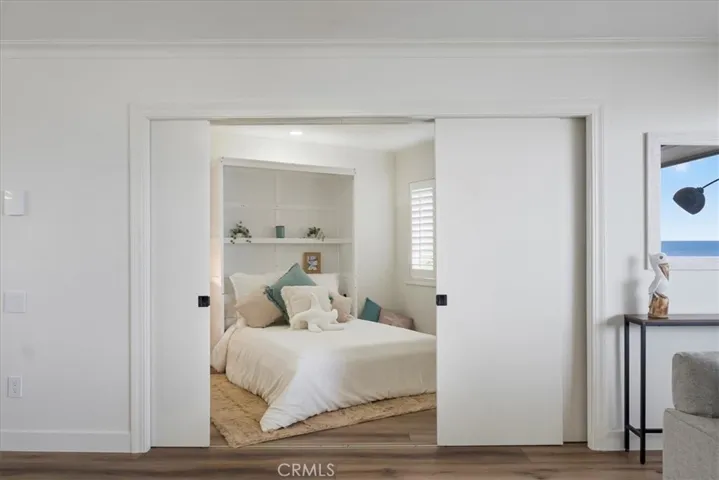 Bedroom two has pocket doors for privacy