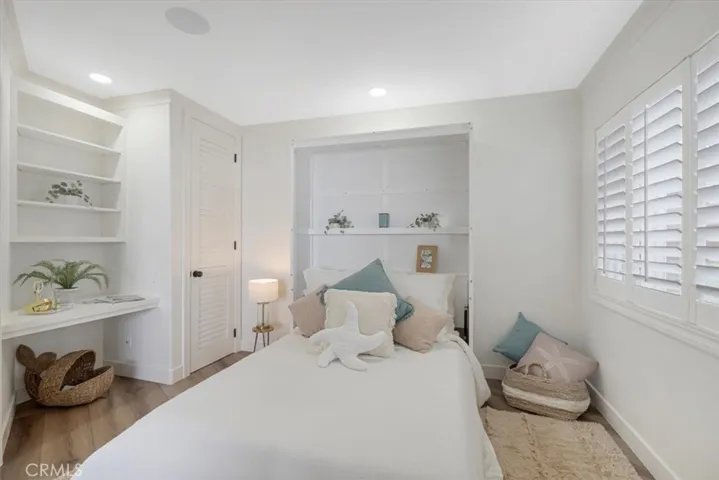 Bedroom two offers a work space