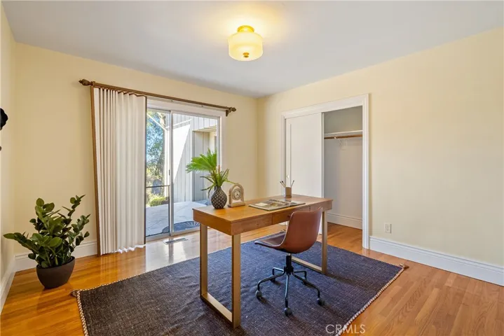 Main Level Bedroom 2 or office with sliding glass door to yard