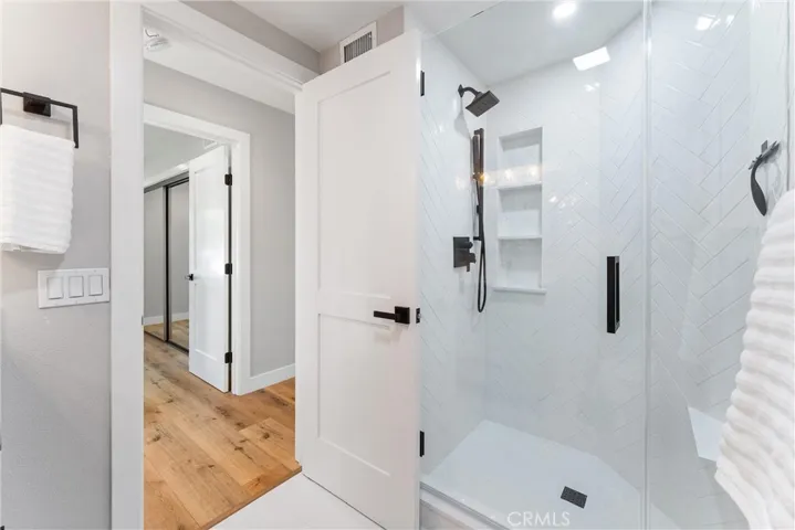MAIN LEVEL FULL BATHROOM WITH SHOWER