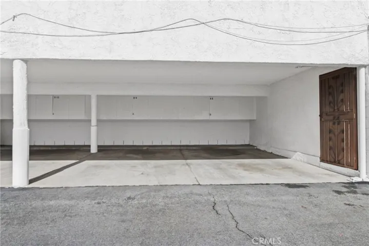 Assigned carport with a large assigned storage area