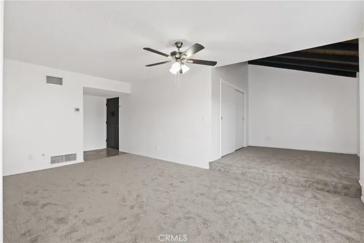 fresh paint, brand new plush carpet, new ceiling fan and light fixture