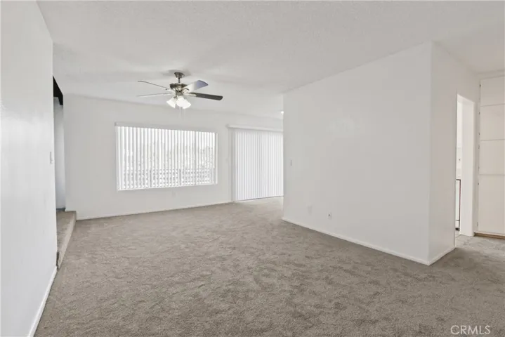 large living room cozy and inviting, new vertical blinds all around