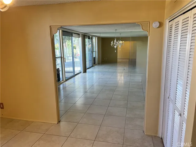 Living room view with slider to the front patio.