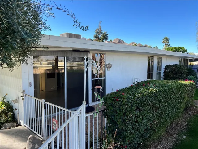 Front patio has two entry gates.