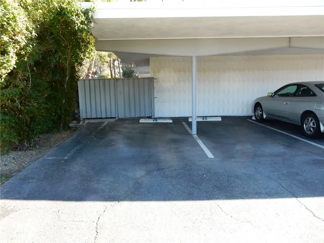 Conveniently located covered carport space. Just a short walk to the front patio. Space 20 on the right belongs to this unit.