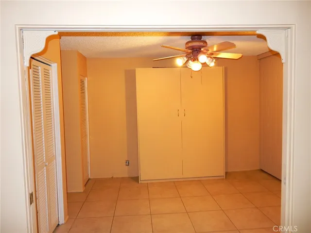 Second bedroom or expanded living area. Wall bed included.
