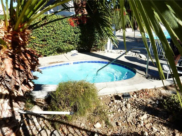 Secluded spa steps from the pool.